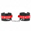 Kink - Wrist Restraints Black With Red Belt Adjustable 17-28 Cm X 6 Cm