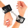 KINK - MULTIPOSITIE POLSBANDAGES MET HANGSLOTSLUITING ZWART VERSTELBAA...