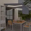 vidaXL Auvent manuel rétractable avec store et LED 4,5x3 m Bleu blanc