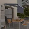 vidaXL Auvent manuel rétractable et store et LED 3x2,5 m Bleu et blanc
