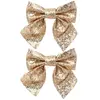 Feeric christmas kerststrikken - 2x - goud - 16 x 14 cm - strikjes