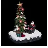 ATMOSPHERA Village de Noël lumineux Père noël dans son fauteuil autour d'un sapin
