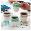 Set de 4 mugs Vilaines Filles avec support