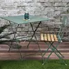 THE HOME DECO FACTORY Table de jardin pliante en métal - Palerme Vert Kaki - Acier - 70x70x71 cm
