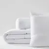 BLANREVE Pack Couette Blanrêve 140 x 200 cm + oreiller 60 x 60 + polochon 90 Gamme Microfibre "Douceur" traité Anti Acarien Soft & care