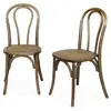 SWEEEK Lot de deux chaises vintage en bois avec assise en rotin et dossier arrondi coloris marron vieilli