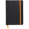 RHODIA 117302C - Carnet Souple Noir - A6 10,5 x 14,8 cm - Ligné - 144 pages - Papier Clairefontaine Ivoire 90 g/m² - Marque-Page, Fermeture Élastique - Couverture Simili Cuir - Collection Rhodiarama