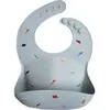 Mushie Bavoir à poche en silicone Retro cars