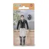 Collecta Eine professionelle Jockeyin mit einem hellen Reithelm