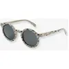 Liewood Lunettes de soleil Darla Dinosaurs (1-3 ans)