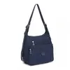 Kono Sac à Dos Bandoulière Imperméable et Antivol pour Femme Sac à Ban...