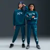 Nike kylian mbappã© club fleece joggingbroek in de kleur groen.