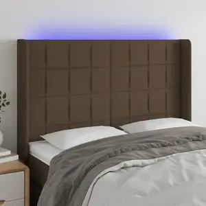 vidaXL Tête de lit à LED Marron foncé 147x16x118/128 cm Tissu pas cher