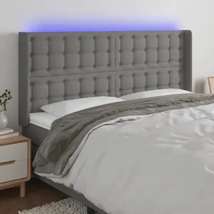 vidaXL Tête de lit à LED Gris foncé 163x16x118/128 cm Tissu pas cher