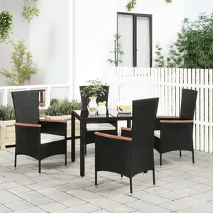 vidaXL Chaises de jardin lot de 4 avec coussins Résine tressée Noir pas cher