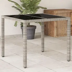 vidaXL Table de jardin avec dessus en verre gris clair résine tressée pas cher