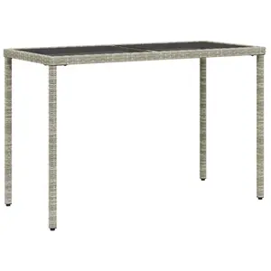 vidaXL Table de jardin dessus en verre gris clair 115x54x74 cm rotin pas cher