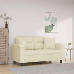 vidaXL Canapé 2 places avec oreillers crème 120 cm similicuir pas cher