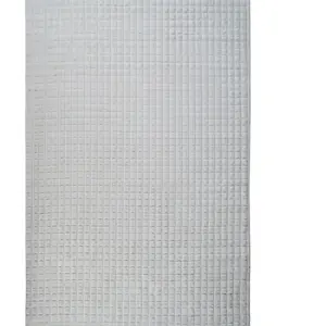 THE DECO FACTORY DAMES - Tapis à relief damier extra-doux blanc 80x150