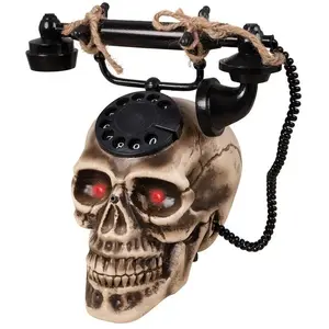 PTIT CLOWN Téléphone tête de mort 22 x 25 cm - DoréVendu parbol