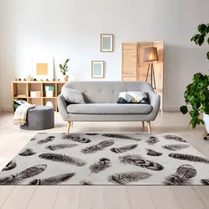 UNAMOURDETAPIS Tapis salon tissé à plat Jacquard diametre 160 plumes gris , tapis en coton pas cher