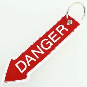 CLJ - Porte-clés - Flèche rouge Danger - Rouge et blanc - Véhicules - Sécurité