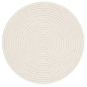 sweeek - Interieurtapijt met cirkelpatroon in crèmekleur