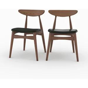 Lot de 2 chaises en cuir synthétique noir et bois dhévéa - Josette - R... pas cher