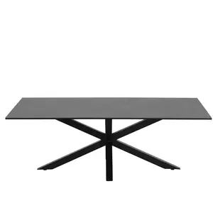 Table basse Hennie 130x70 cm avec plateau noir en céramique et pieds croisés en métal noir mat. pas cher