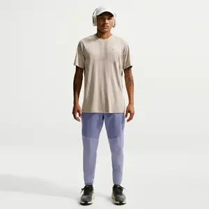 Pantalon de survêtement Nike Stride Repel Violet M pas cher