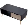 Image de Table basse avec tiroir style scandinave noire FREJA. Table de salon en bois avec rangement. Table rectangulaire avec pieds en bois.