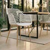 Image de IDIMEX Lot de 4 chaises Lucia pour Salle à Manger ou Cuisine au Design Retro avec accoudoirs, Coque en Plastique Blanc et 4 Pieds en métal décor chêne Sonoma