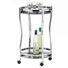 Image de IDIMEX Chariot de Service Vega Table d'appoint Ronde sur roulettes Chariot à thé et Boisson en métal chromé, avec 2 étagères en Verre trempé Noir