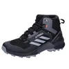 Image de adidas Terrex Swift R3 Mid GTX Baskets pour homme, Noyau noir, gris, trois solaires, 40.5 EU