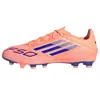 Image de adidas Chaussures de football unisexes F50 Messi Club Firm Multi Ground, Orange/bleu, 42 2/3 EU