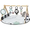Image de Tiny Love Luxe Developmental Gymini, Tapis d’éveil musical pour bébé, dès la naissance, tapis de jeu, 20 activités, jouet musical nomade, 12 cartes d’étapes, Black & White Décor