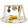 Image de Tiny Love Luxe Developmental Gymini, Tapis d’éveil pour bébé, dès la naissance, tapis de jeu bébé, activités à 360°, coussin pour temps sur le ventre, arches ajustables, Garden of Adventures