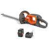 Image de Taille-haie Husqvarna à batterie 215iHD45 avec batterie BLi10 et chargeur 40-C80, silencieux et performant pour un usage privé intensif
