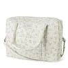 Image de Babyshower Sac de maternité Camille Olive Bloom, Fond blanc cassé