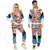 Image de Widmann - Costume de survêtement des années 80 Pop Art, brille sous la lumière UV, veste et pantalon, bande dessinée, survêtement, style rétro, salle de bain, carnaval