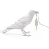 Image de Seletti Bird Lamp Waiting lampe de table corbeau blanc