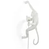 Image de SELETTI Lampe « Monkey » en forme de singe, applique fixée au niveau de la main droite du singe, blanc