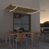 Image de vidaXL Auvent manuel rétractable avec LED 450x300 cm Jaune et blanc
