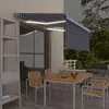 Image de vidaXL Auvent rétractable manuel avec store LED 3,5x2,5m Bleu et blanc