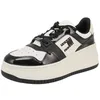 Image de Tommy Hilfiger EN0EN02523 Basket rétro   Baskets pour femme   YBI Ivory-Black, Ybi Ivory Black, 36 EU