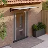 Image de vidaXL Auvent de porte Noir et transparent 199x90 cm Polycarbonate