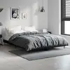 Image de vidaXL Cadre de lit sans matelas noir 140x190 cm bois d'ingénierie