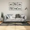 Image de vidaXL Tapis lavable noir et doré 120x180 cm