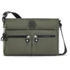 Image de Sac à bandoulière KIPLING New Angie 27.5 cm - green moss - Fermeture zippée