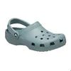 Image de Crocs Classic Gris Unisexe 43/44 - Confort Léger et Ergonomique Parfait pour Intérieur et Extérieur